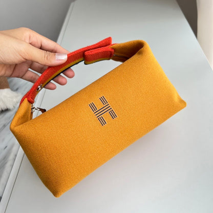 ✖️SOLD✖️ Hermes Small Bride a Brac in Beige Canvas and Orange Handle